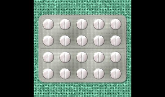 pills on green textured background