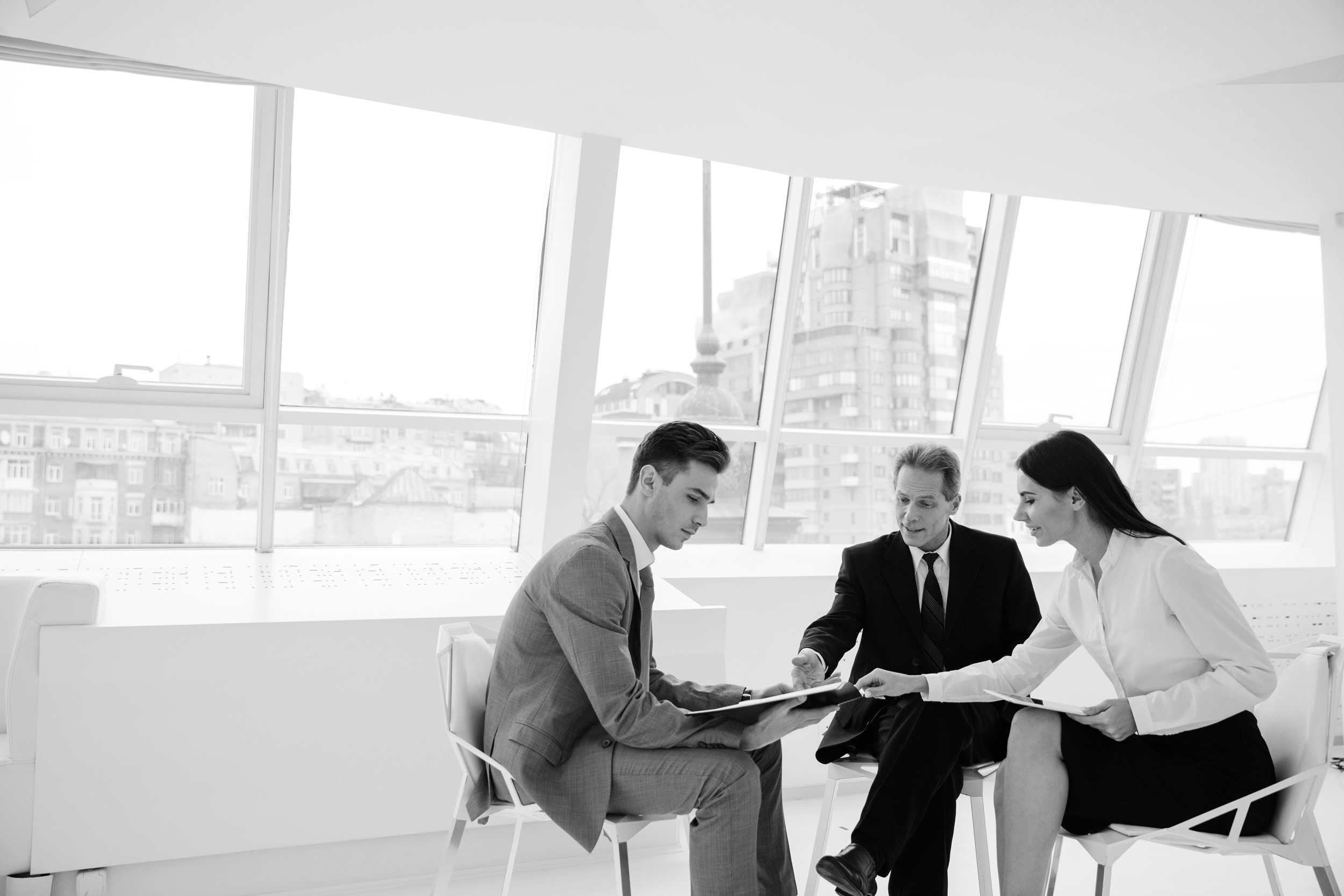 Three people in a discussion
