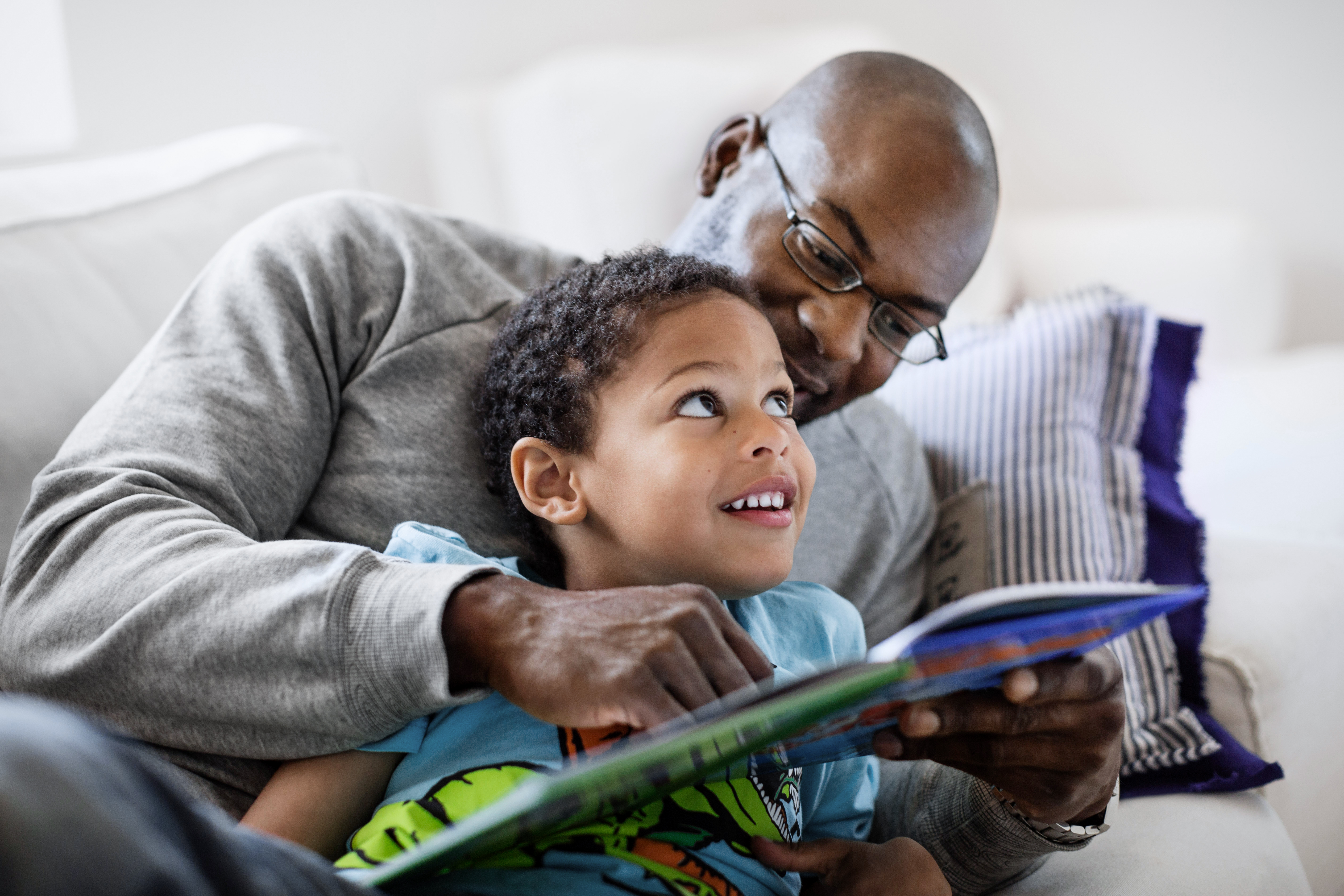 Parent and child reading a book