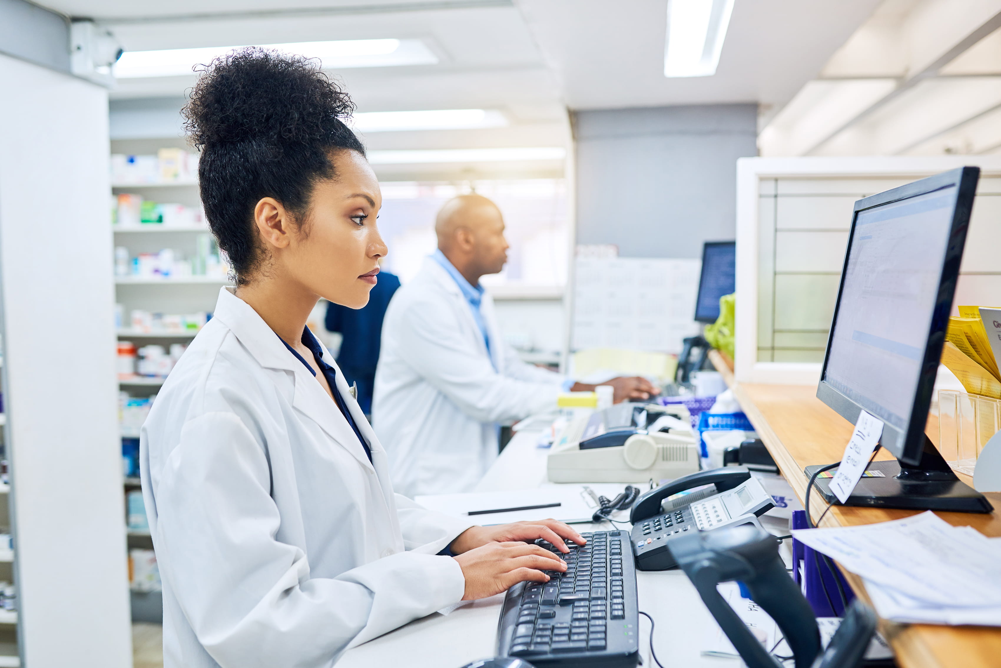 pharmacist at computer